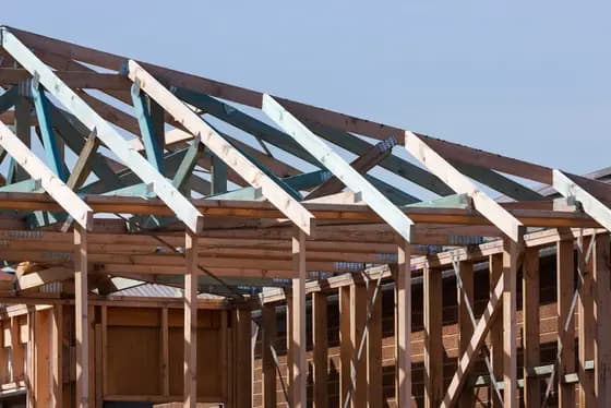 A building frame with roof timbers in place